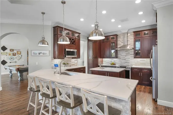 $1,135,000 | 2313 Southwest Golden Bear Way, Palm City, FL 34990