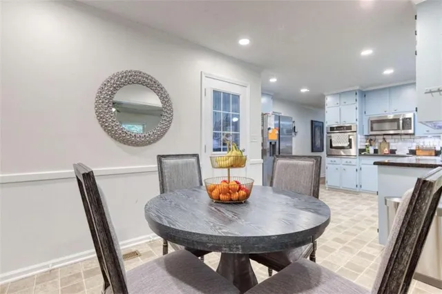a view of a dining room with furniture