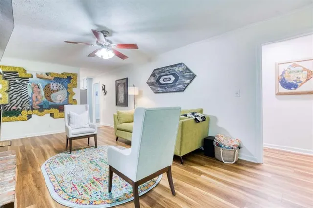 a living room with furniture and a table