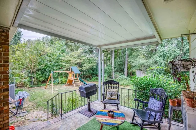 a view of porch with a patio