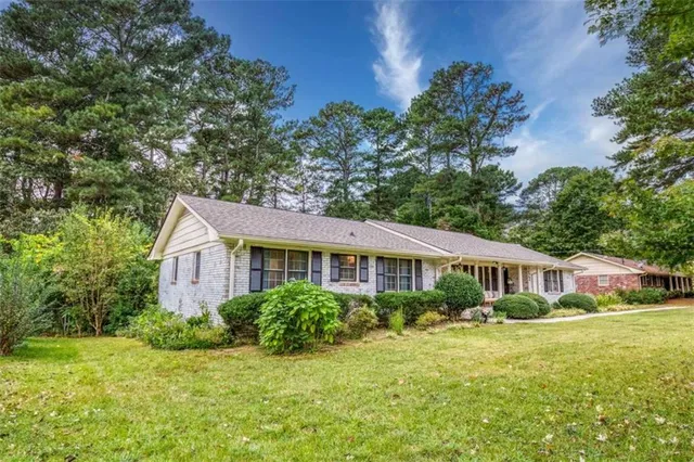 a house view with a garden space