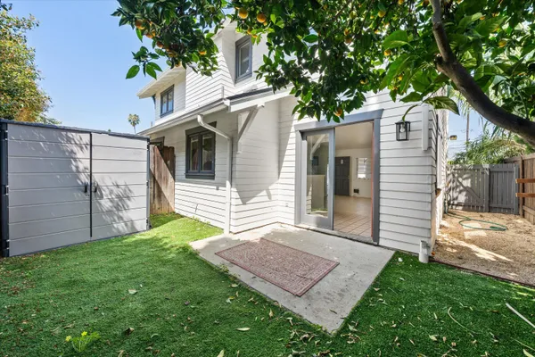 a view of a back yard of the house