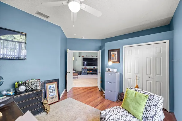 a bedroom with furniture and a bed