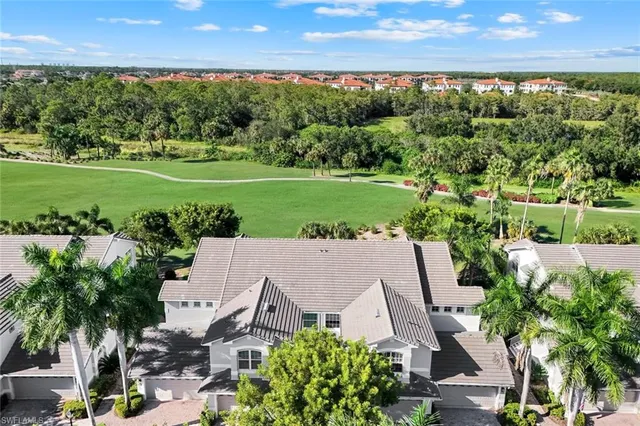 an aerial view of a house with outdoor space swimming pool and outdoor seating
