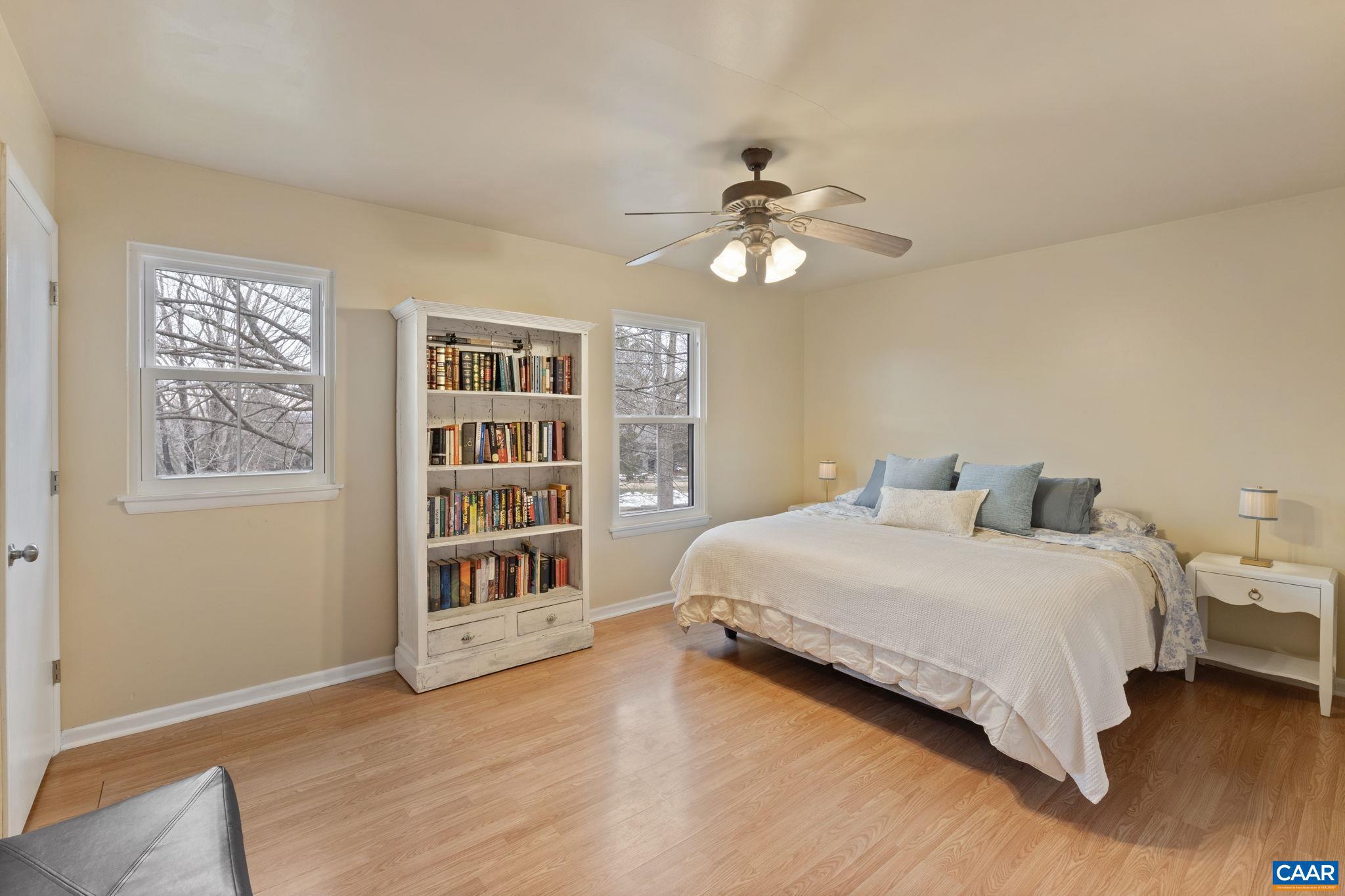 782 Merion Greene Charlottesville, VA 22901 - Photo 17 of 32 a bedroom with bed and a bookshelf