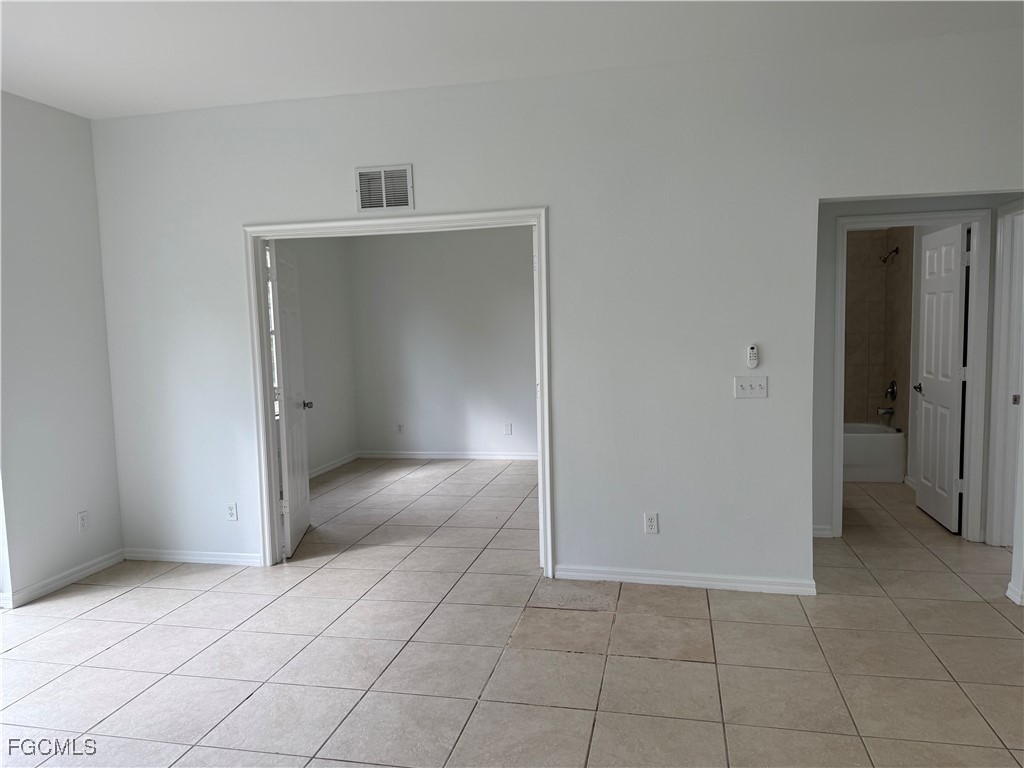 3969 Sunset Road Lehigh Acres, FL 33971 - Photo 7 of 29 a view of an empty room and closet area