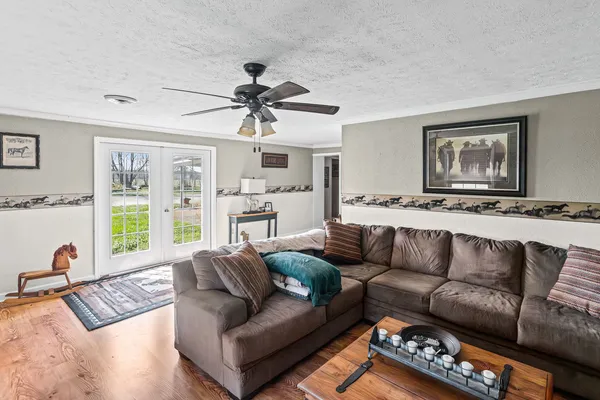 an aerial view of a house with a yard