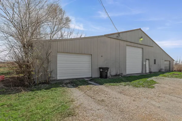 a view of a park with large trees