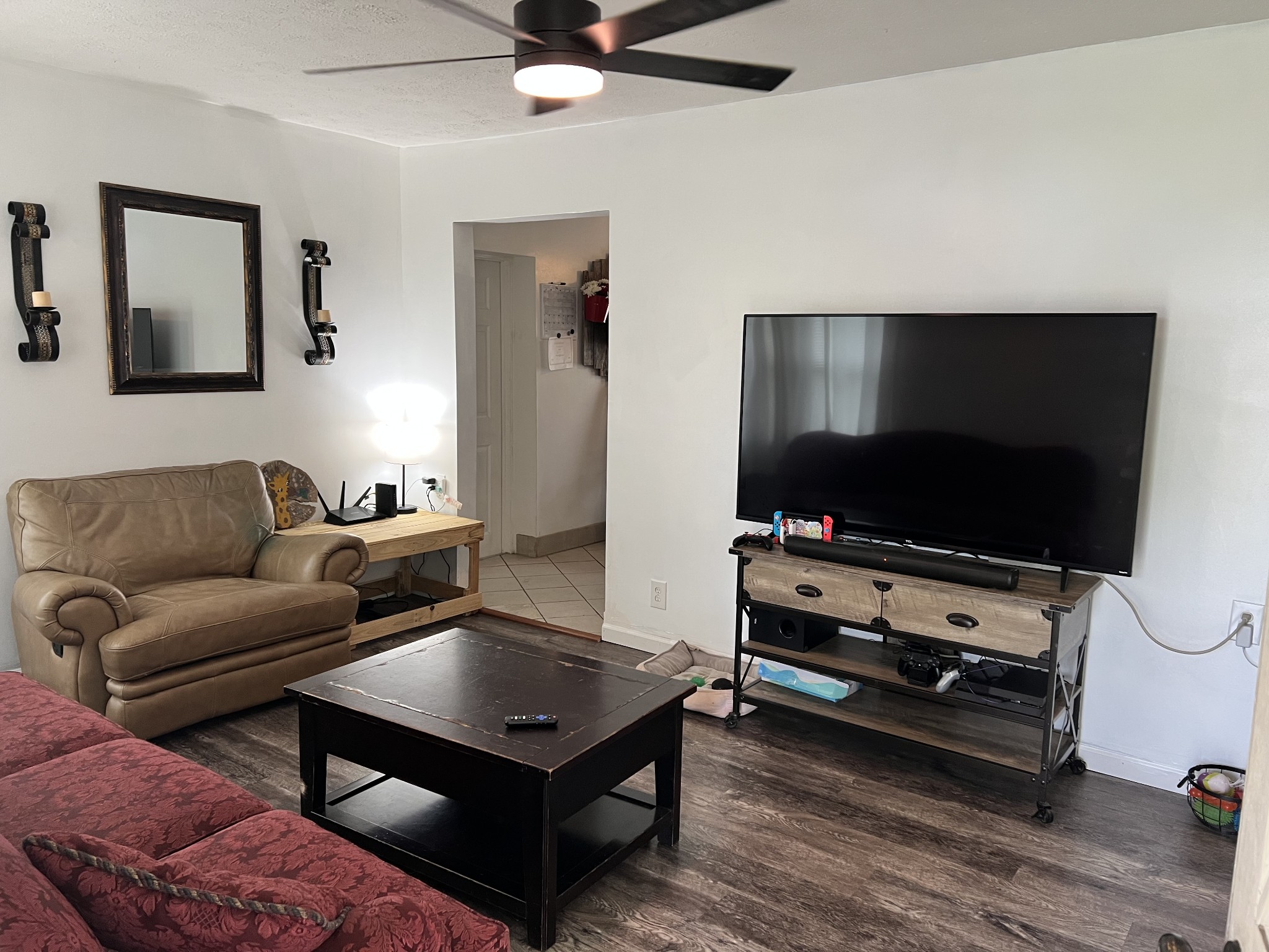 431 Elm Street Baxter, TN 38544 - Photo 3 of 22 a living room with furniture and a flat screen tv