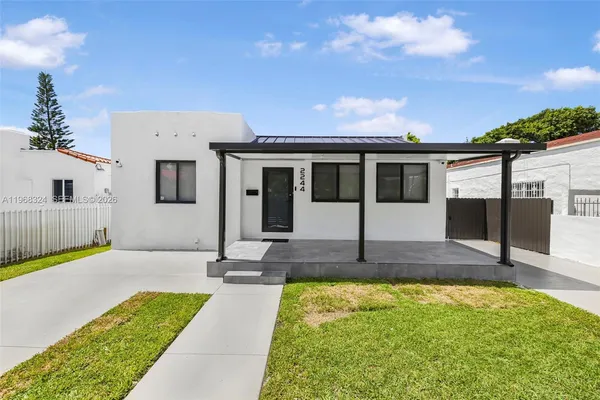 a swimming pool with outdoor seating