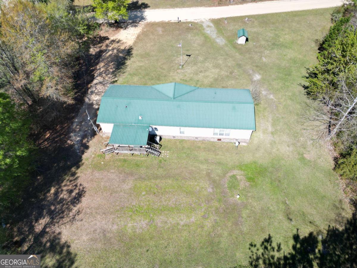 4156 Smiley Road Ludowici, GA 31316 - Photo 29 of 32 an aerial view of residential house with an outdoor space