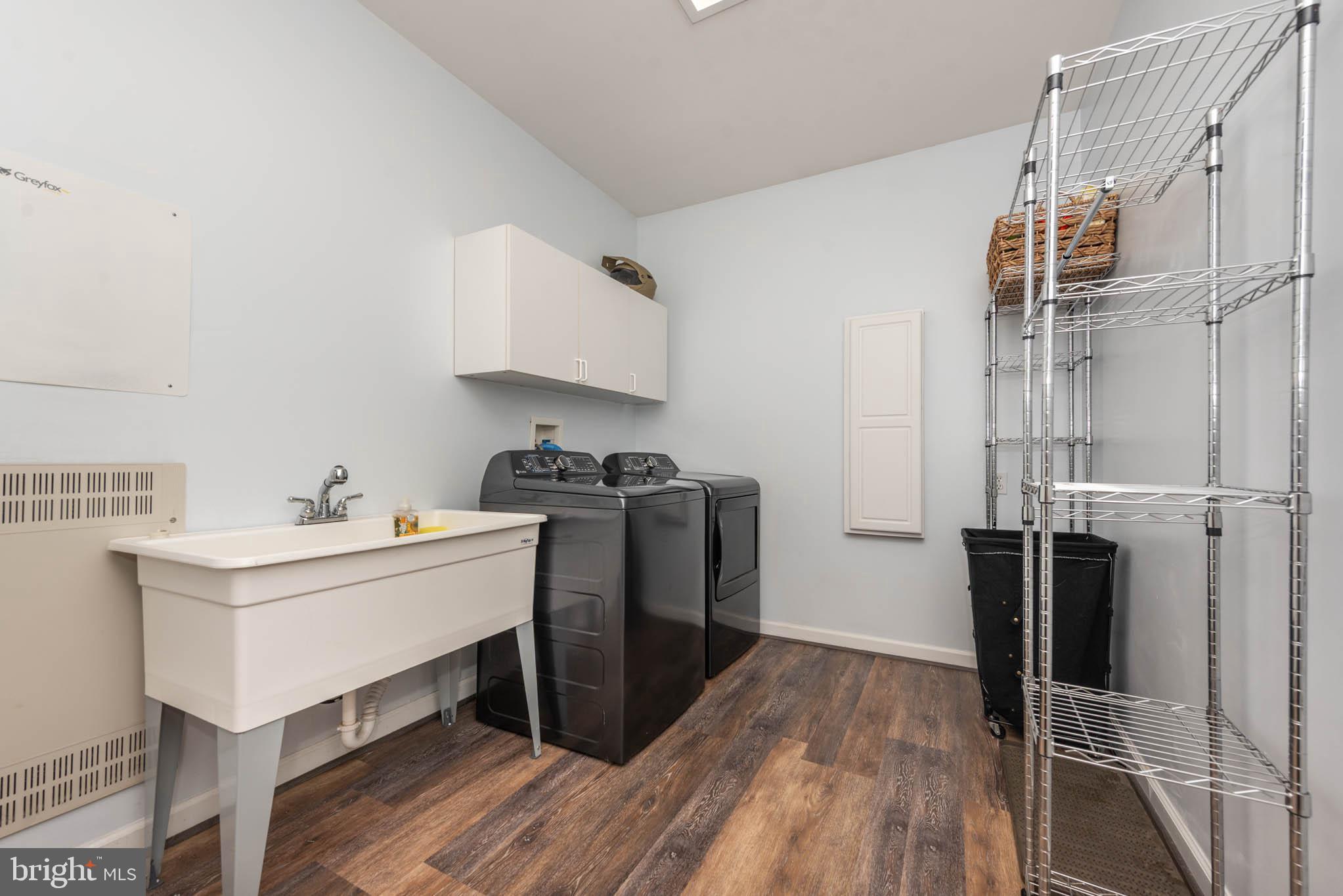 2623 Urey Road White Hall, MD 21161 - Photo 13 of 60 a kitchen with a sink appliances and cabinets