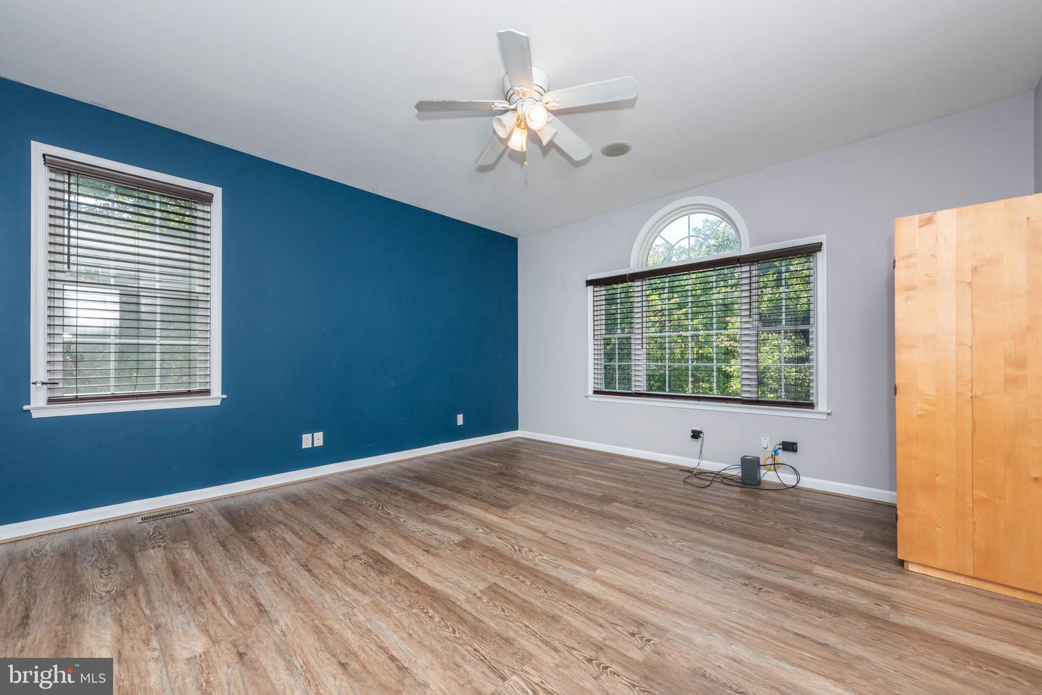2623 Urey Road White Hall, MD 21161 - Photo 25 of 60 a view of an empty room with a window and wooden floor