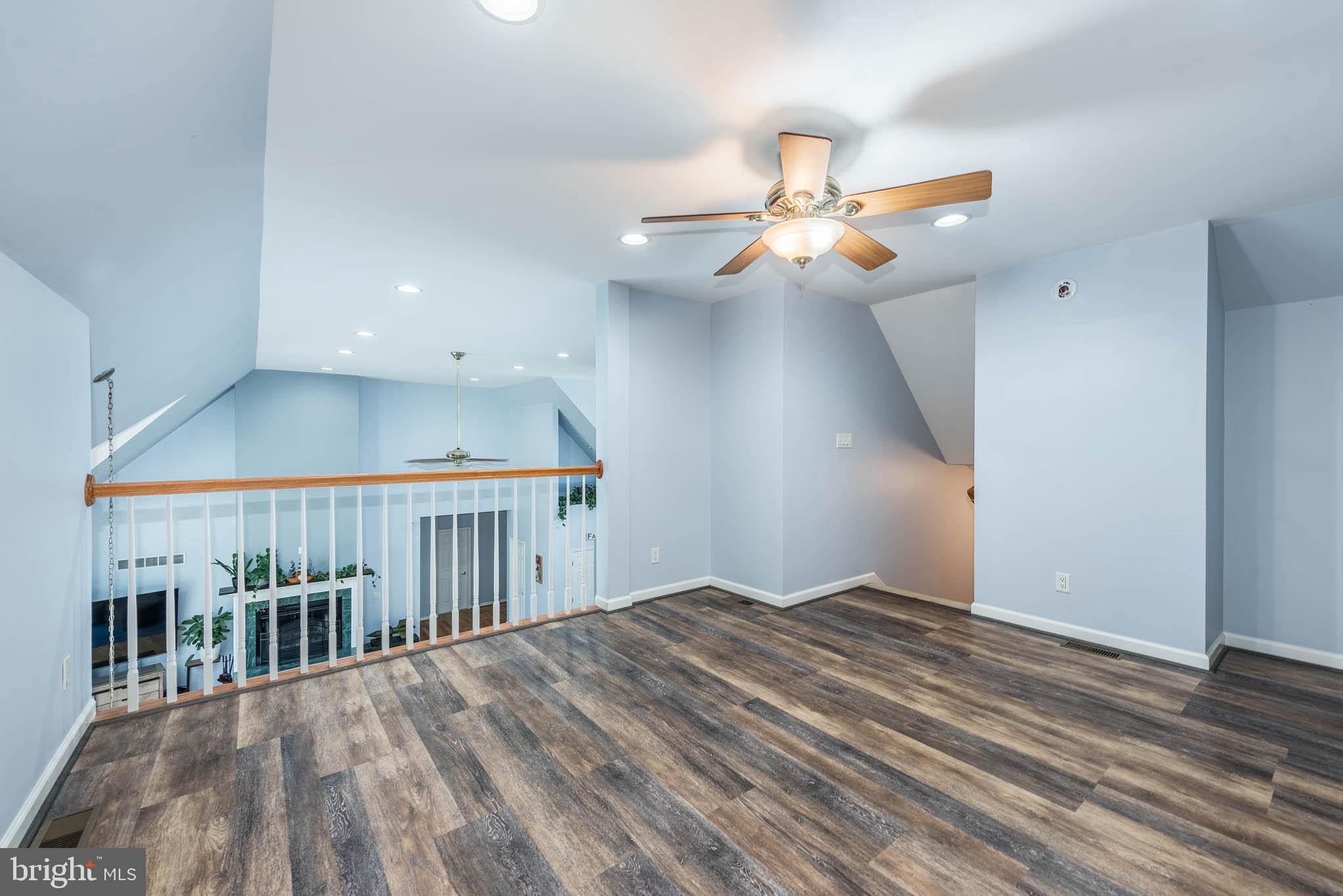 2623 Urey Road White Hall, MD 21161 - Photo 28 of 60 wooden floor in a hall with a window