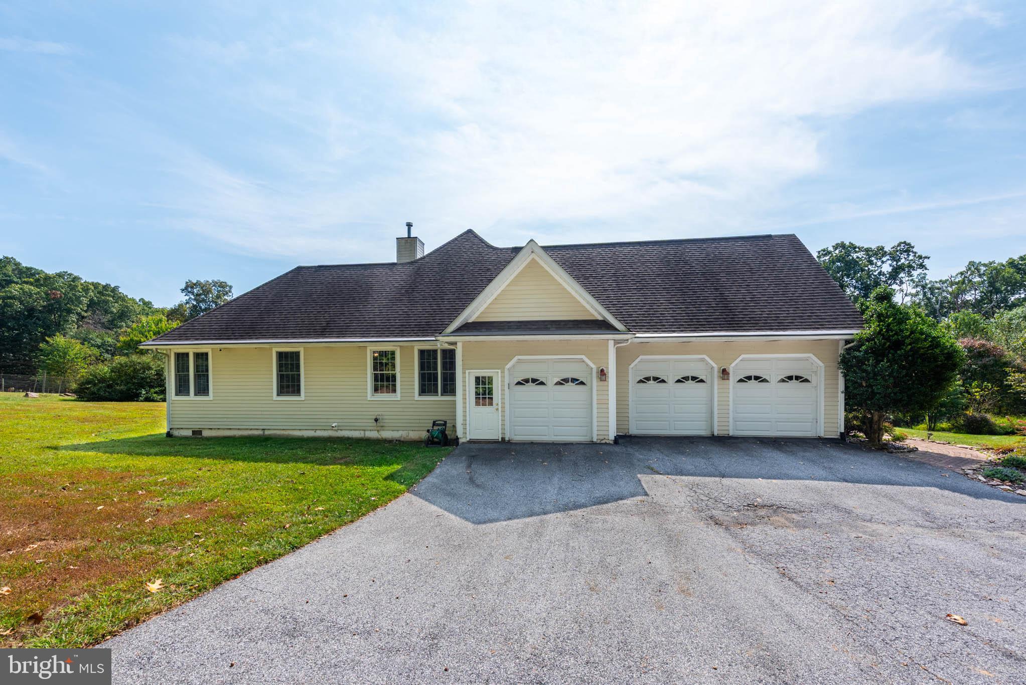 2623 Urey Road White Hall, MD 21161 - Photo 33 of 60 front view of a house with a yard
