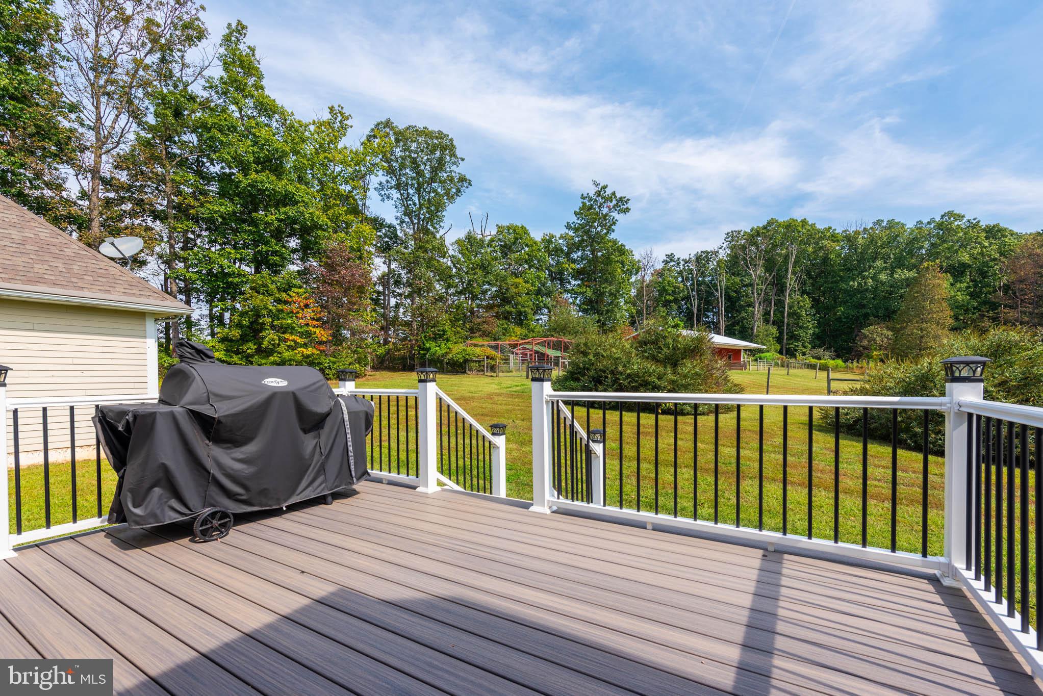 2623 Urey Road White Hall, MD 21161 - Photo 34 of 60 a view of a roof deck with wooden floor and fence