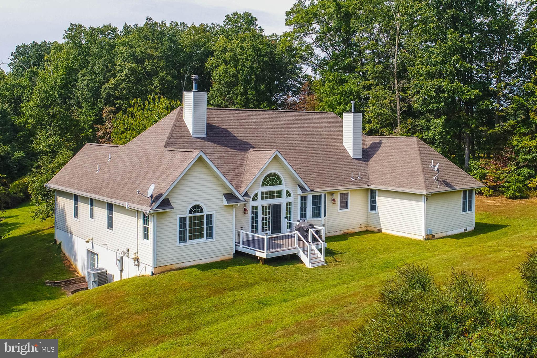 2623 Urey Road White Hall, MD 21161 - Photo 37 of 60 a front view of a house with a yard