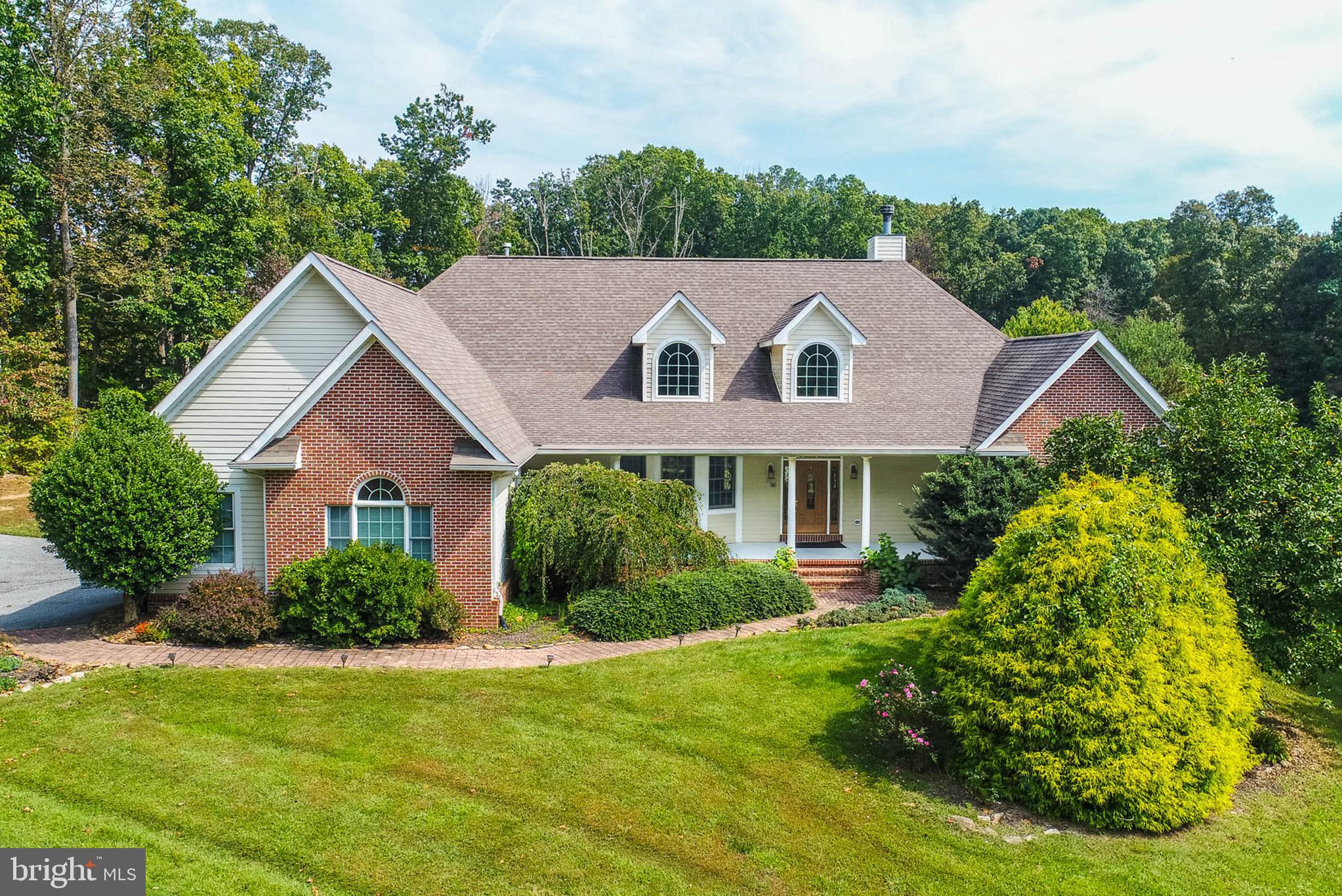 2623 Urey Road White Hall, MD 21161 - Photo 39 of 60 a front view of a house with a yard