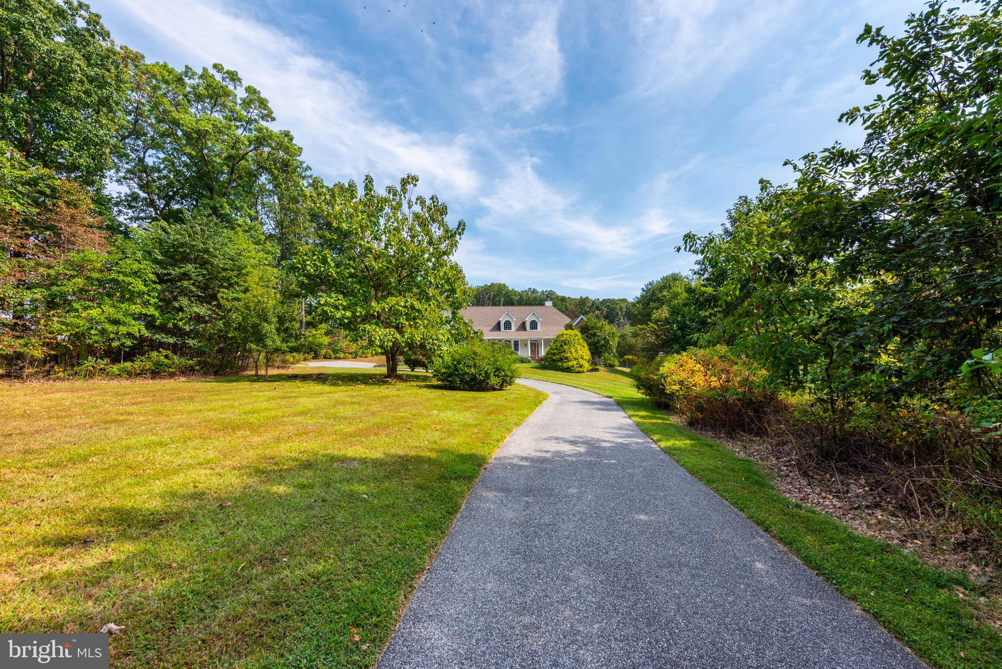 2623 Urey Road White Hall, MD 21161 - Photo 43 of 60 a view of a yard with an trees