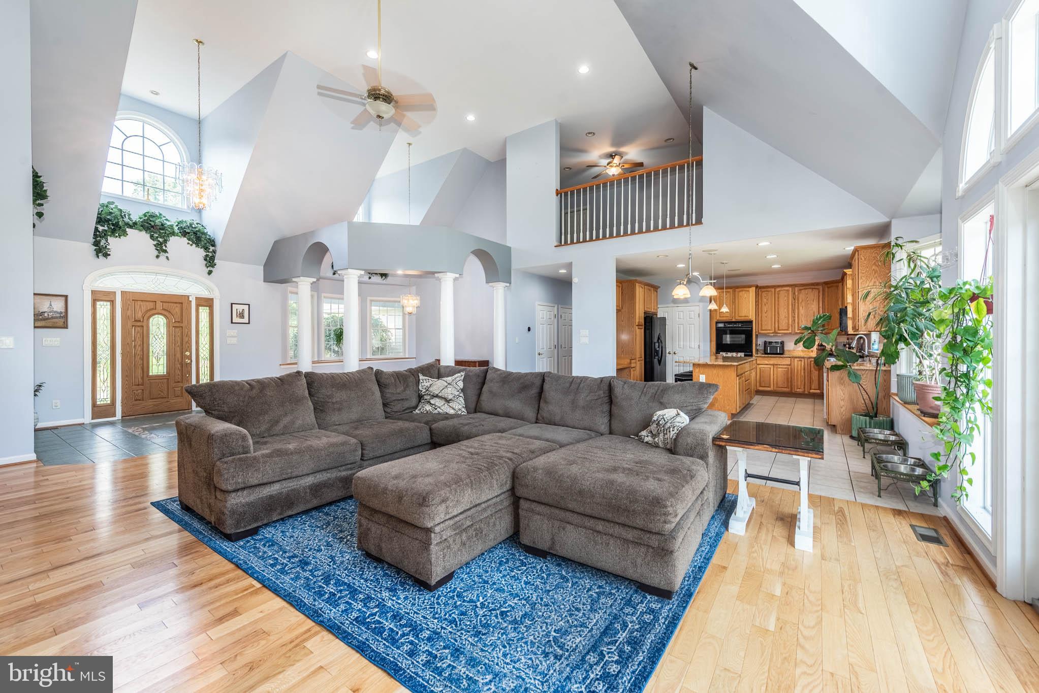 2623 Urey Road White Hall, MD 21161 - Photo 5 of 60 a living room with furniture and a wooden floor