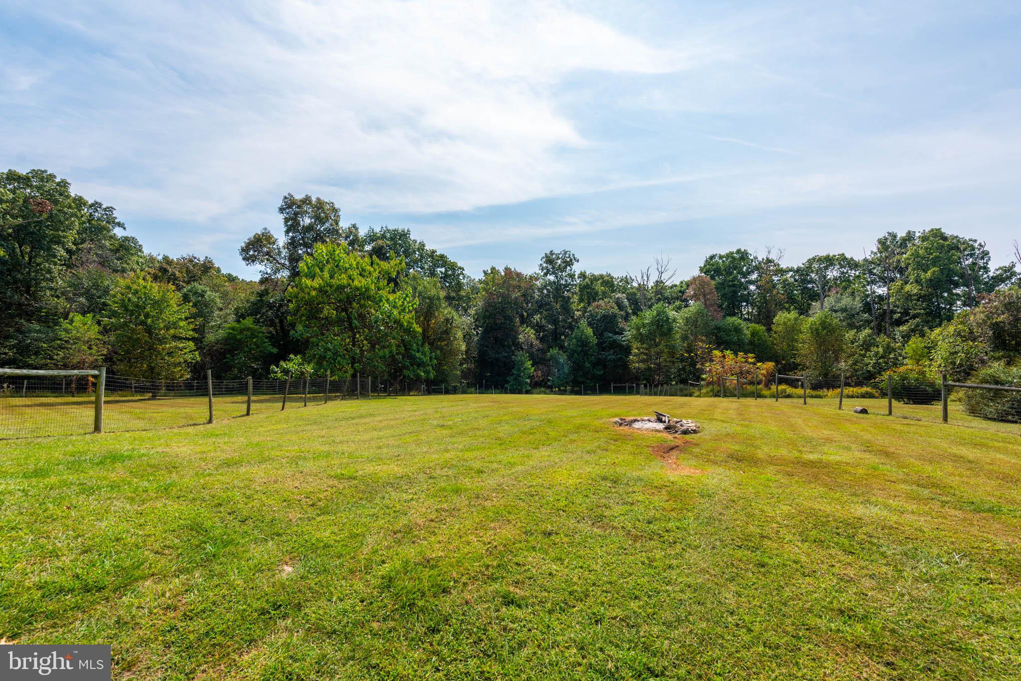 2623 Urey Road White Hall, MD 21161 - Photo 52 of 60 a view of a swimming pool with an outdoor space and seating area