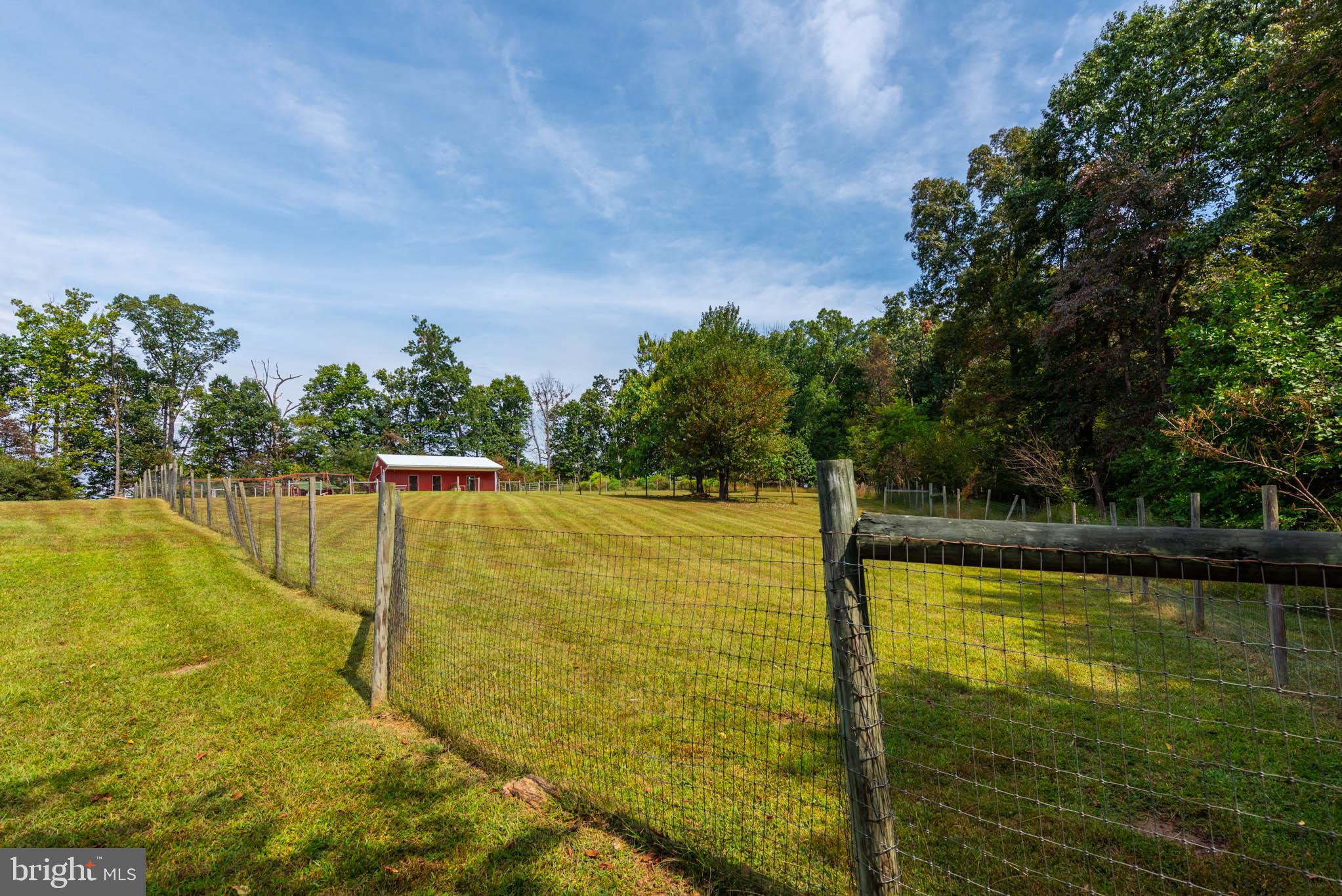 2623 Urey Road White Hall, MD 21161 - Photo 57 of 60 a view of a swimming pool with an outdoor seating and a yard