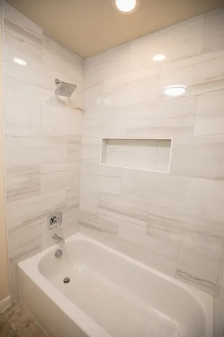 a bathroom with a bathtub