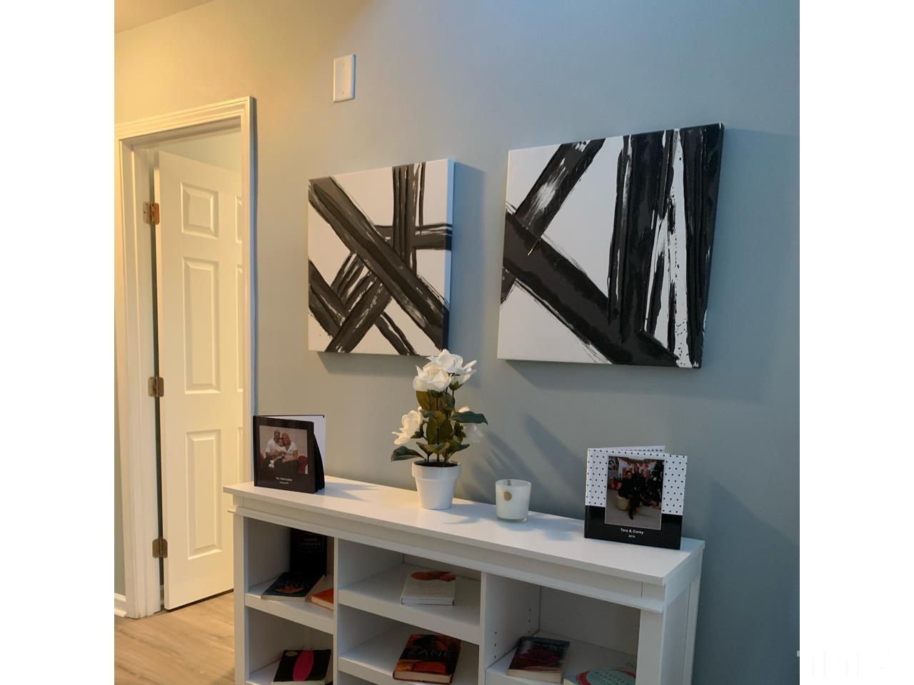 1422 Infinity Lane Raleigh, NC 27610 - Photo 3 of 16 a workspace with furniture and window