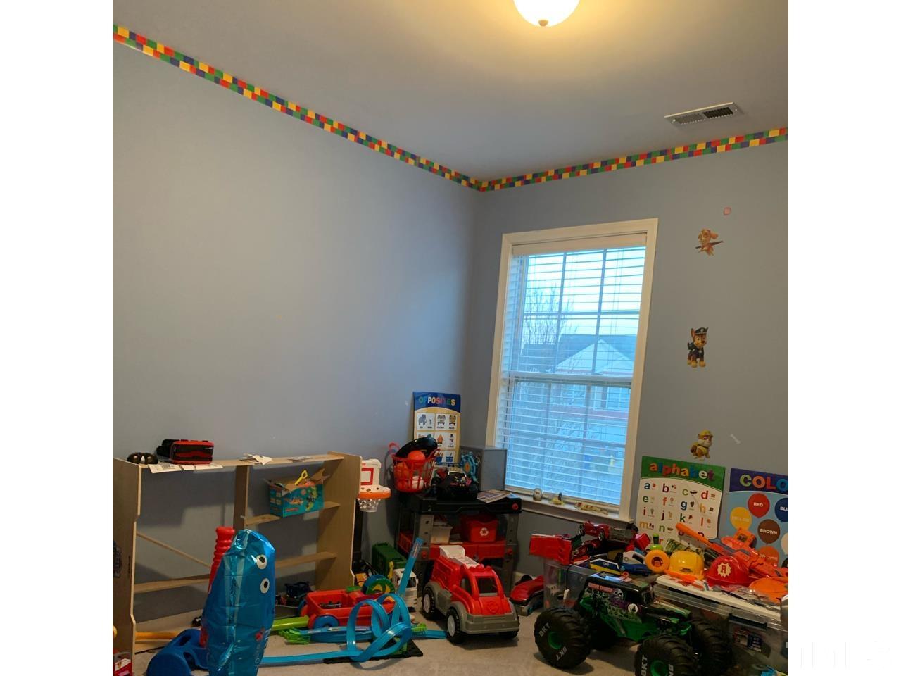 1422 Infinity Lane Raleigh, NC 27610 - Photo 10 of 16 a view of kids room with toys