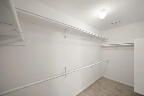 a view of a room with racks on the wall