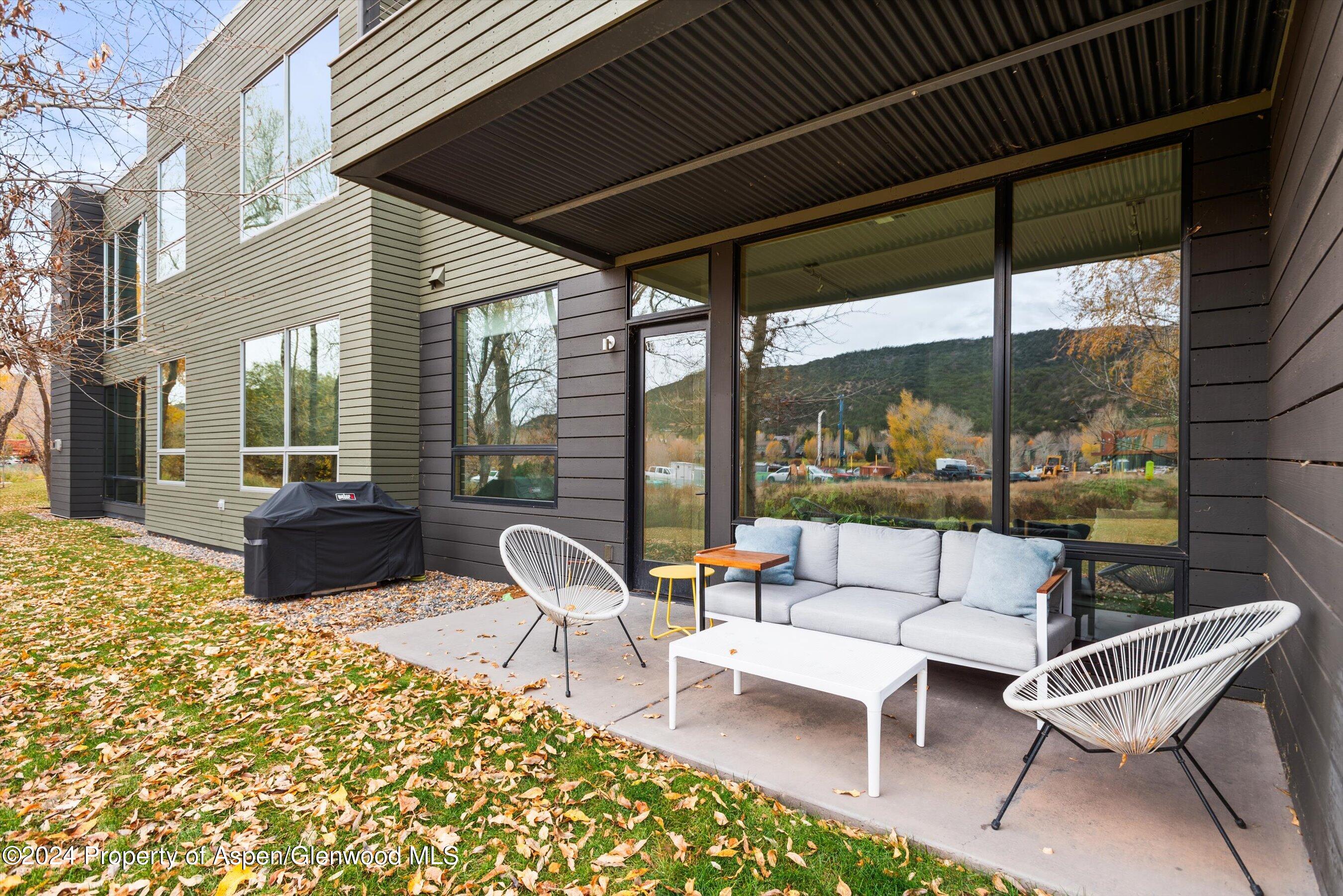 102 Evans Road, Unit 106 Basalt, CO 81621 - Photo 10 of 12 a building outdoor space with patio furniture