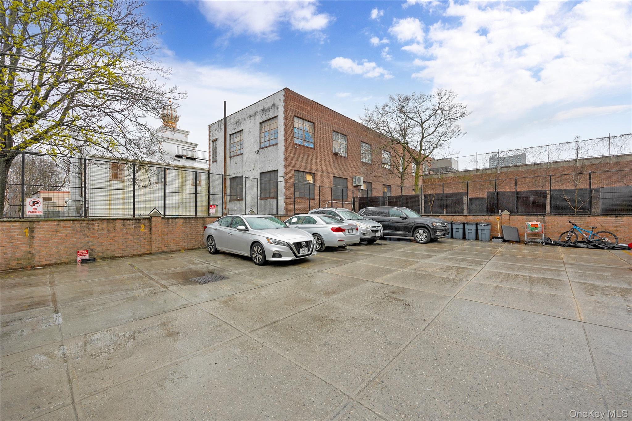 172-18 Jamaica Avenue, Unit 6C Queens, NY 11432 - Photo 19 of 23 a cars parked on the side of street