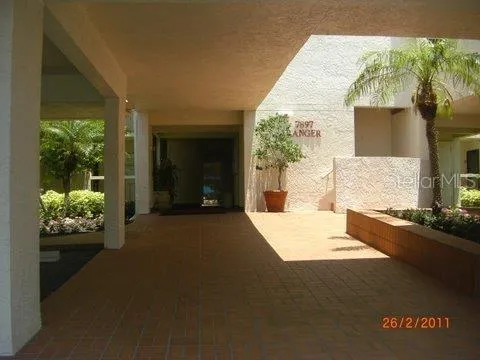 a view of backyard of a house