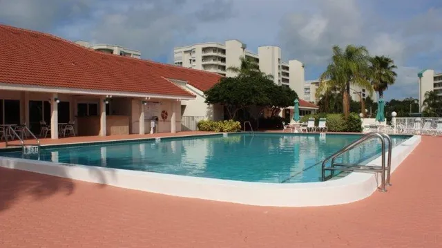 a view of a house with a swimming pool