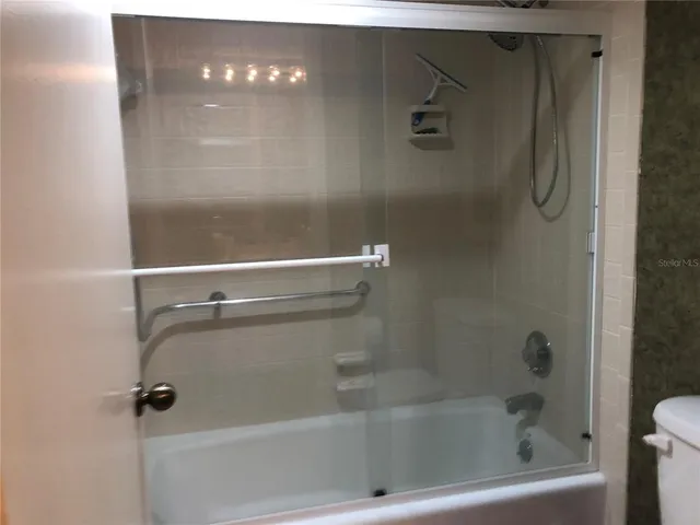 a close view of a bathtub in bathroom