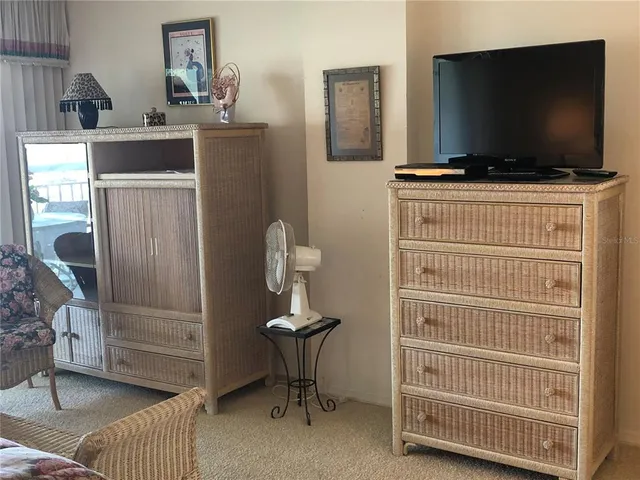 a room with furniture and a flat screen tv