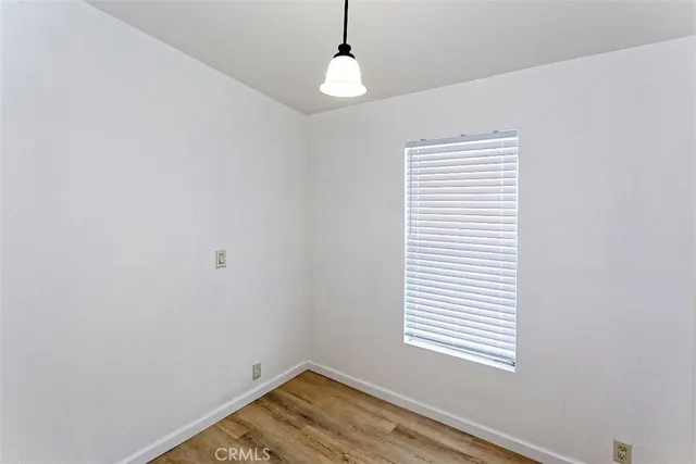 a view of a house with a potted plant