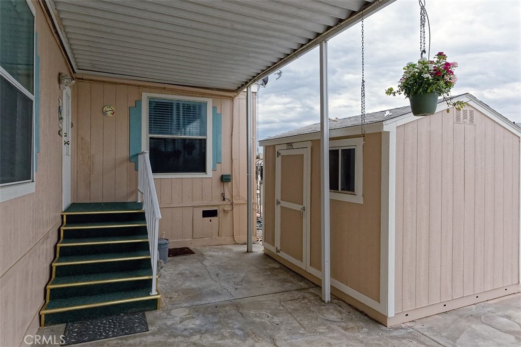 2727 Pacific Street, Unit 78 Highland, CA 92346 - Photo 21 of 27 a view of a house with a potted plant