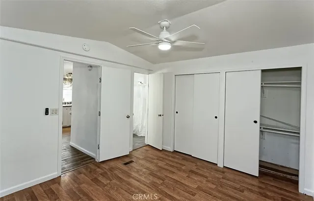 a view of a livingroom with wooden floor