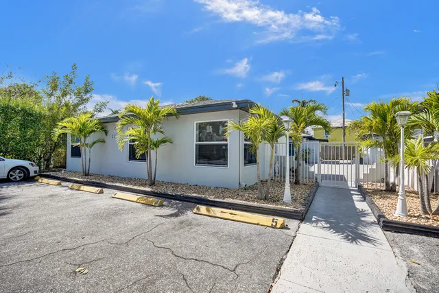 a front view of a house with outdoor space