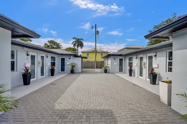 a front view of a house with a porch