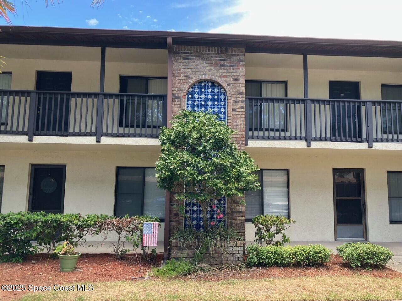 1515 Huntington Lane, Unit 223 Rockledge, FL 32955 - Photo 4 of 15 a front view of a house