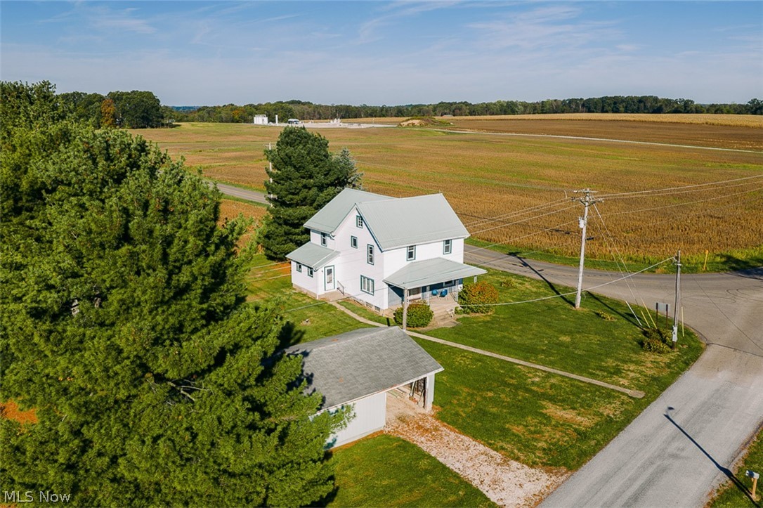 15 Glecoe Road Southwest Carrollton, OH 44615 - Photo 8 of 50 Overview of rural landscape with rows of crops