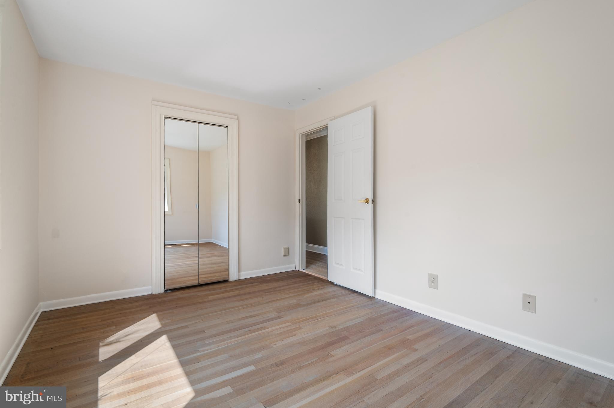 15729 Holly Grove Road Silver Spring, MD 20905 - Photo 58 of 83 Bright and airy bedroom 3 with mirrored closet.