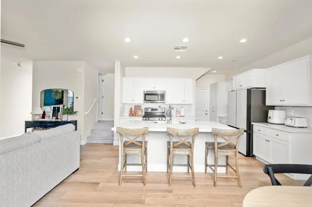 a view of a dining room kitchen and a sink