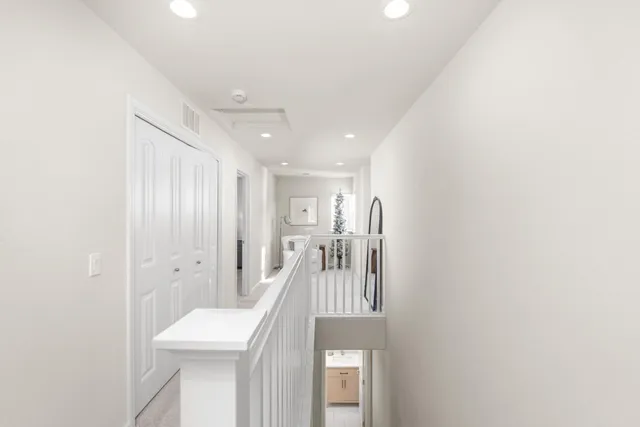 a bathroom with a sink a toilet and a shower