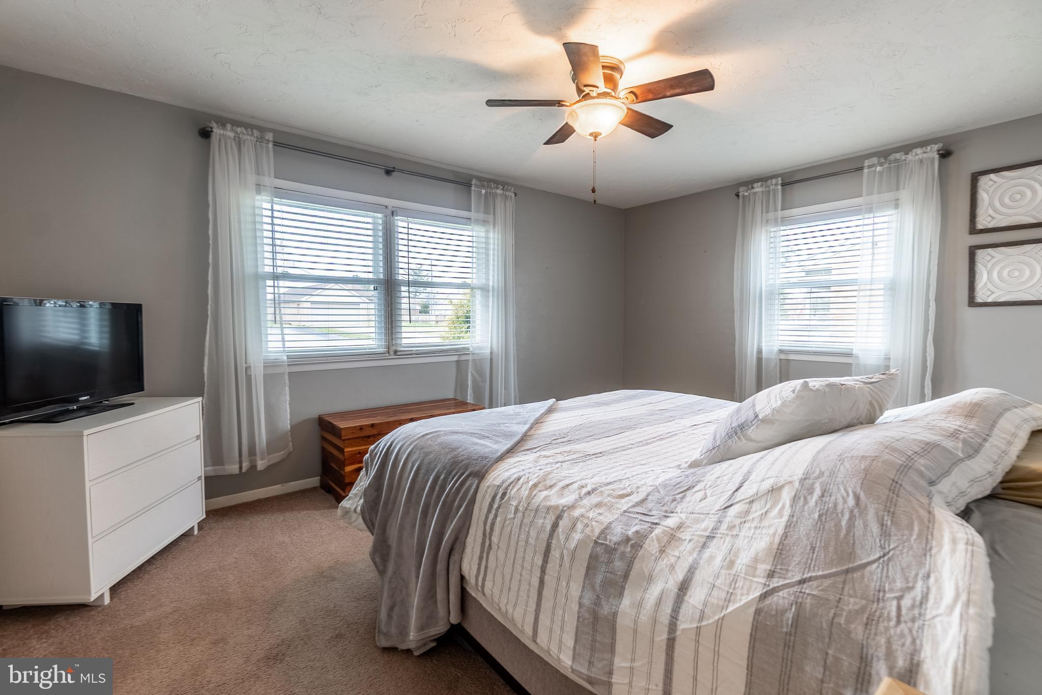 717 East Walnut Street Hanover, PA 17331 - Photo 12 of 21 a bedroom with a bed and a flat screen tv