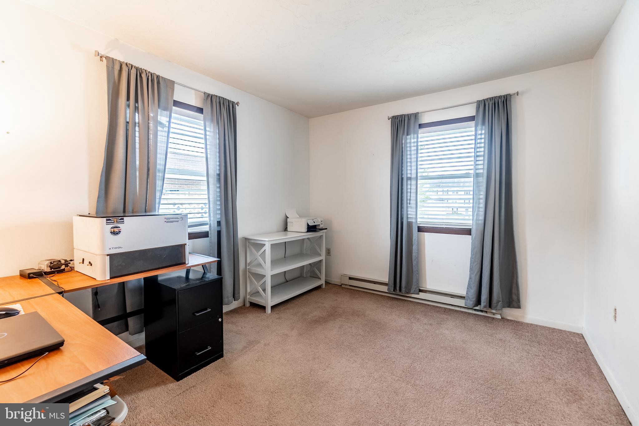 717 East Walnut Street Hanover, PA 17331 - Photo 13 of 21 a view of livingroom with furniture and windows