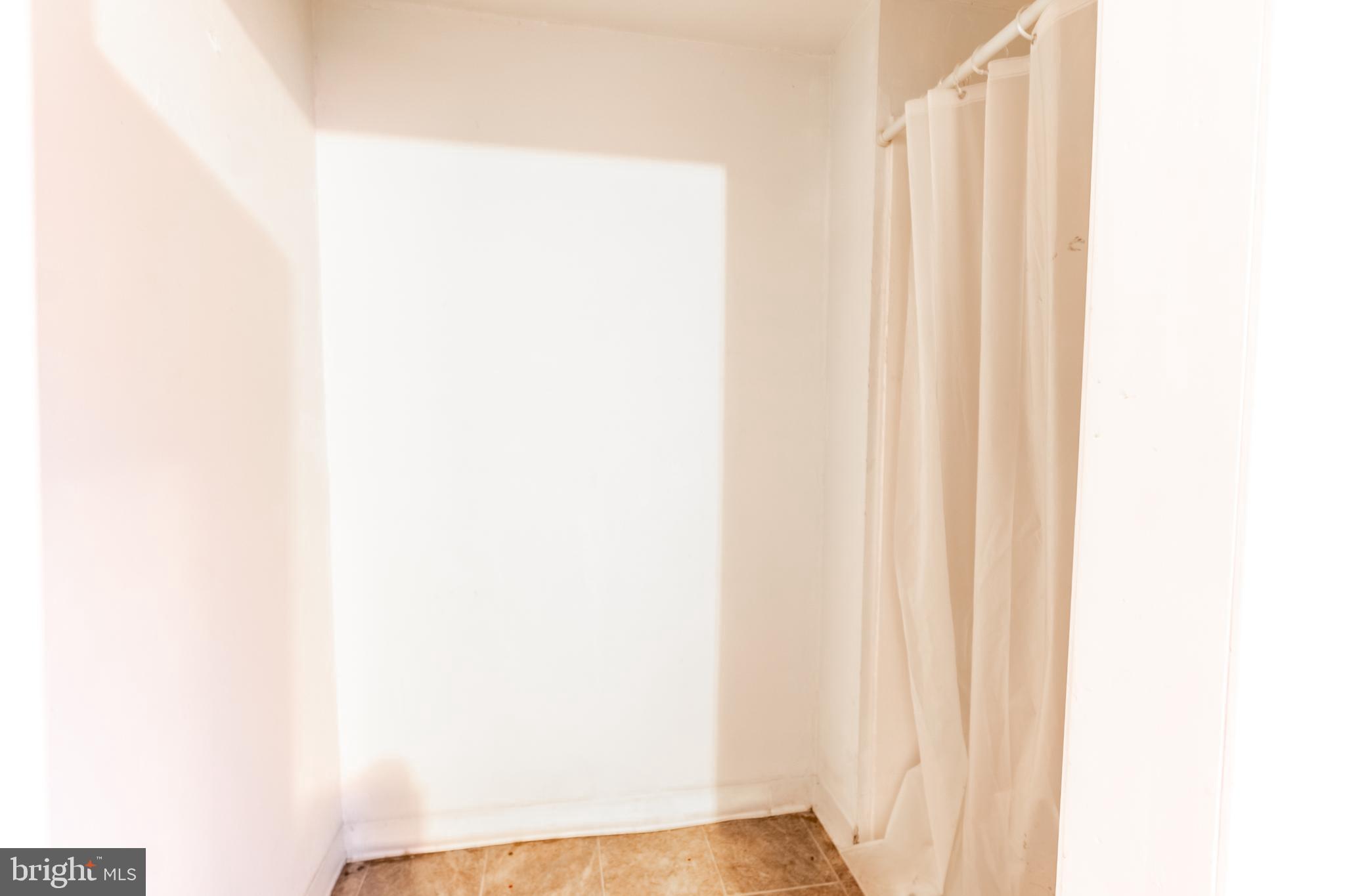 717 East Walnut Street Hanover, PA 17331 - Photo 19 of 21 a view of a room with a white wall and a window