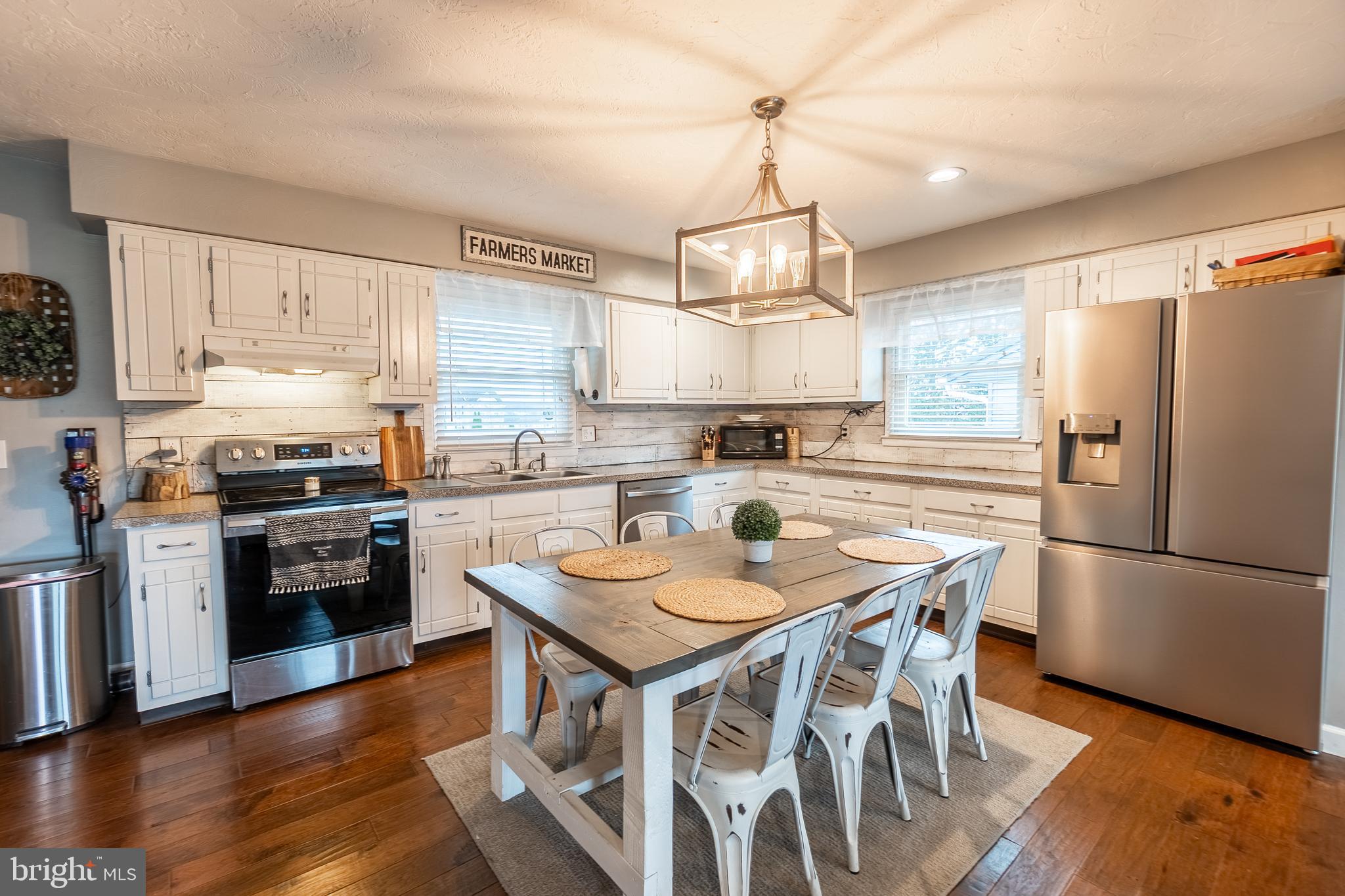 717 East Walnut Street Hanover, PA 17331 - Photo 6 of 21 a kitchen with a refrigerator a stove a sink and a refrigerator